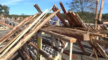 Timber planks leaning against supports