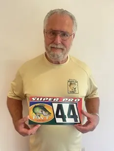 Elderly man with competition number