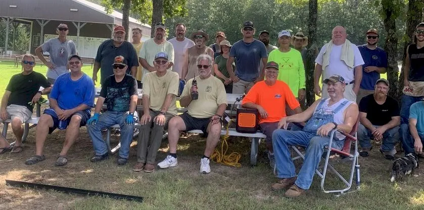 Men gathered for a casual outdoor event