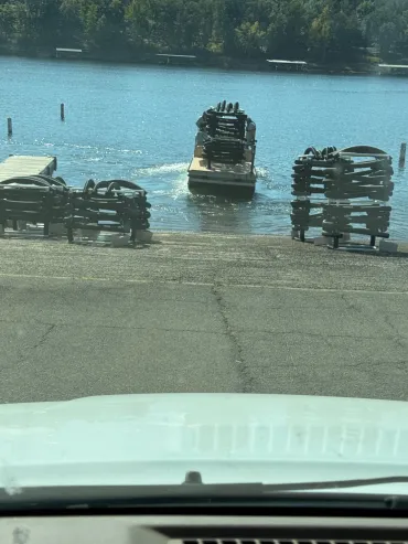 Calm lake scene with docking boat
